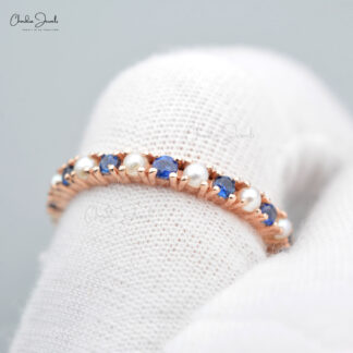 Solid Rose Gold Eternity Ring with Blue Sapphire Gemstones