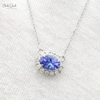 Tanzanite diamond halo necklace in 14k white gold