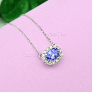 Tanzanite diamond halo necklace in 14k white gold