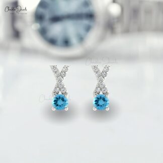 Natural Swiss Blue Topaz Studs Earring In 14k Solid Gold With White Diamond Criss Cross Earring 5mm Round Cut Handmade Gemstone Earring For Women’s