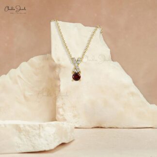 AAA Quality Garnet Criss Cross Pendant in 14K Gold